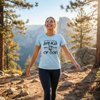Woman hiking wearing an ice blue Armor of God T-shirt